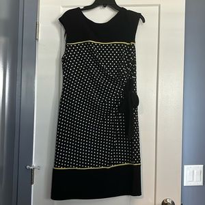 Cute polka dotted dress with side tie